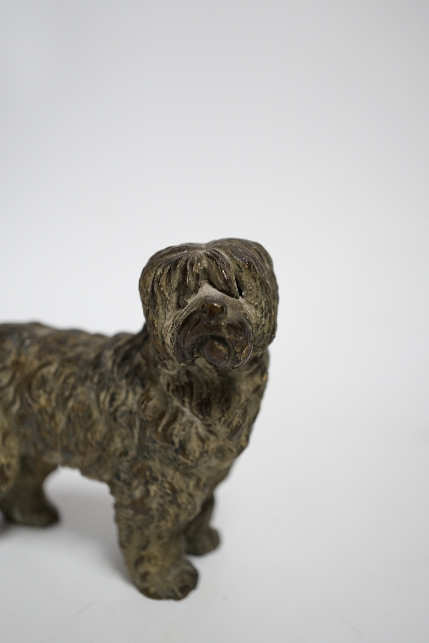 A cold painted bronze model of a dog, 11cm wide